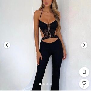 Outcast Lace-Detail Halter Cutout Jumpsuit in Black
